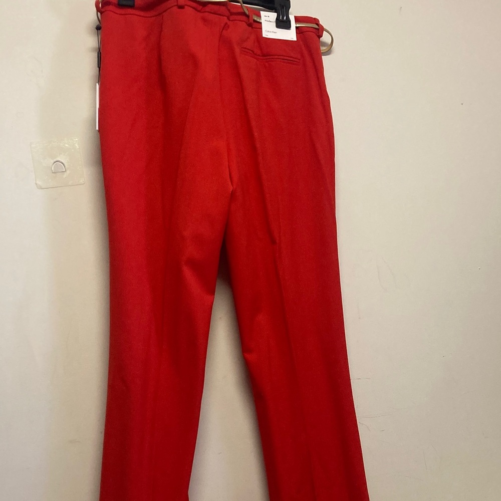 Calvin Klein ladies Bold Red Dress Pants with a slim gold belt. - Picture 2 of 2